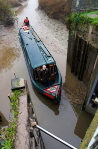 John Revell steers his boat Olive Emily through the lock into the Old Bedford River at the latest attempt made in November.