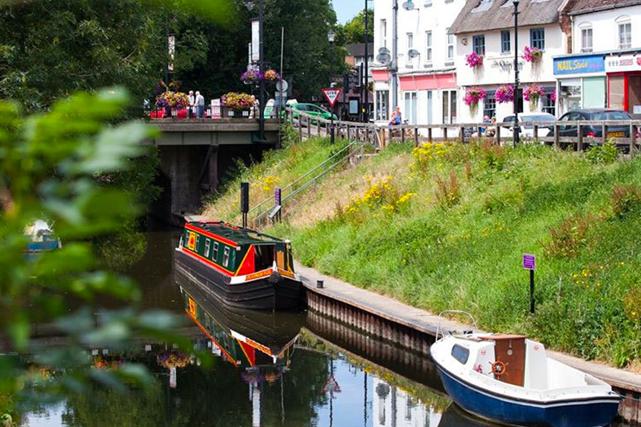 outwell fox narrow boat moored by the shops