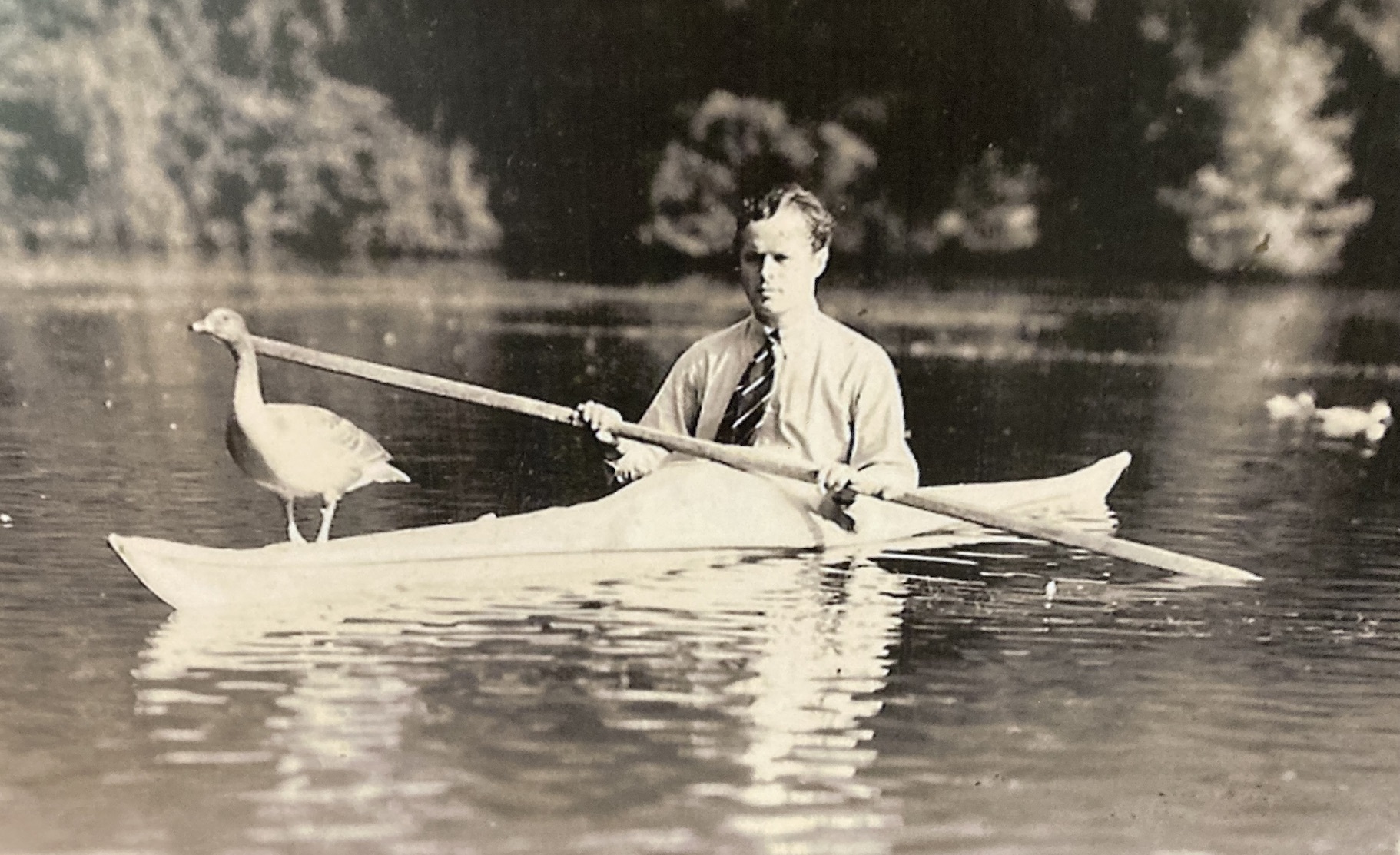 Young Peter Scott on a boat